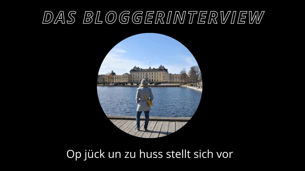 eine frau schaut auf ein gebäude, das am ufer steht